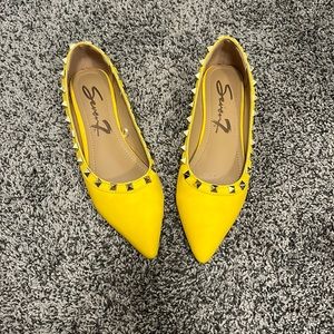 Brand new yellow flats